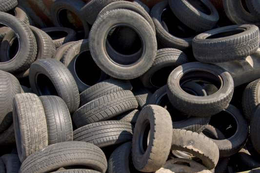 A pile of car tires waiting to be recycled.