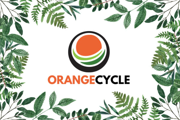 Graphic with the Orange Cycle logo surrounded by a border of plants and ferns