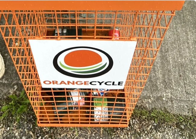 Photo of Orange Cycle branded Recycling Bin